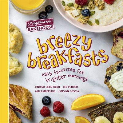 Words playfully spelling breezy breakfasts. Oatmeal and berries pictured as well