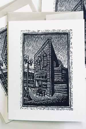 Three scratchboard drawing cards with envelopes arranged in a loose stack