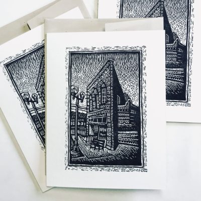 Three scratchboard drawing cards with envelopes arranged in a loose stack